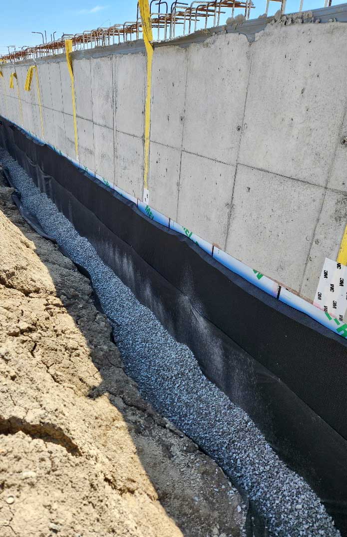 Trench fill from stone slingers in Ontario Veromix.