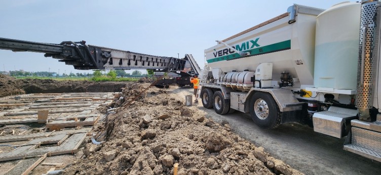 volumetric concrete veromix truck laying foundation